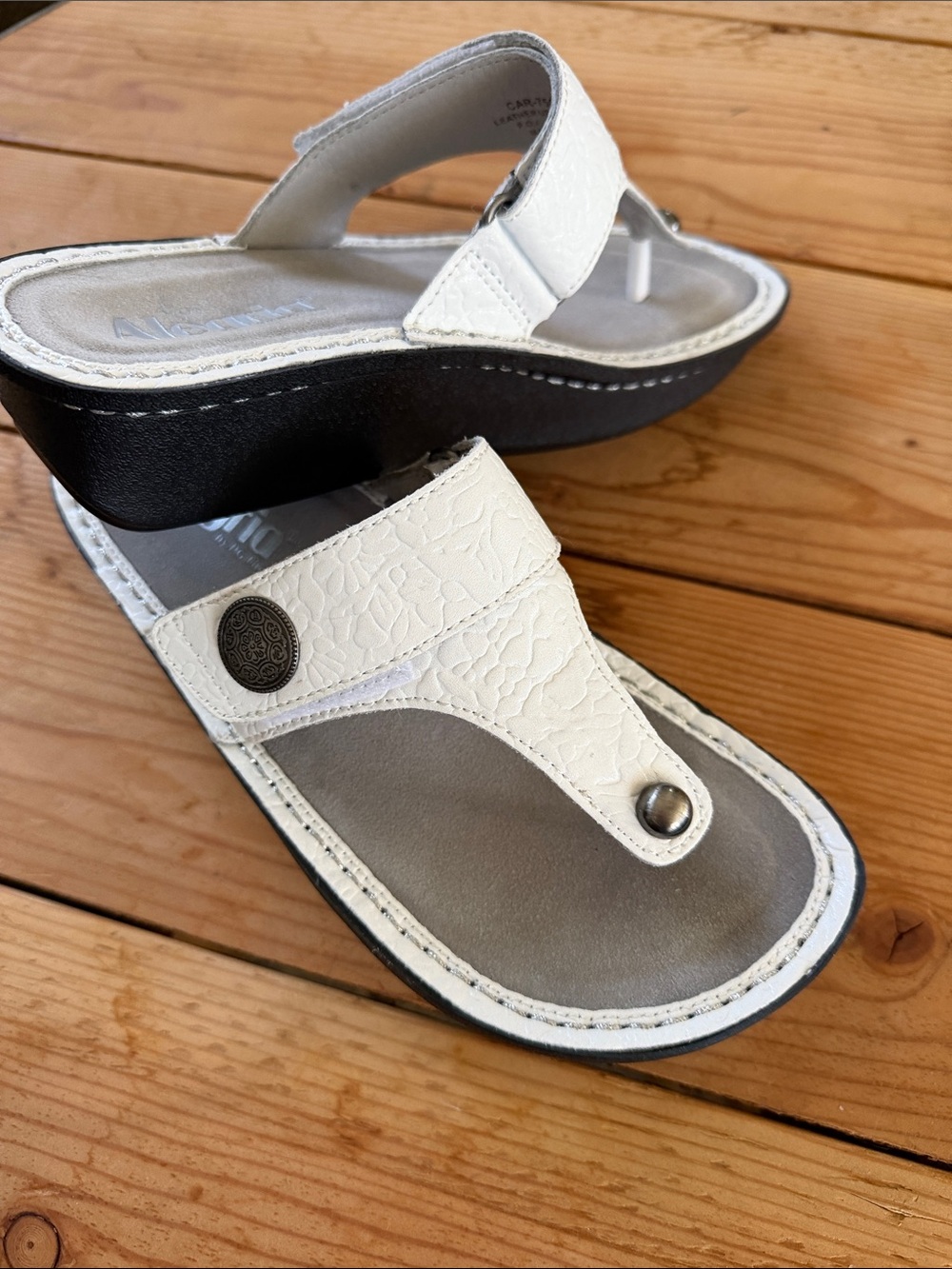 Alegria White Textured Thong Sandals